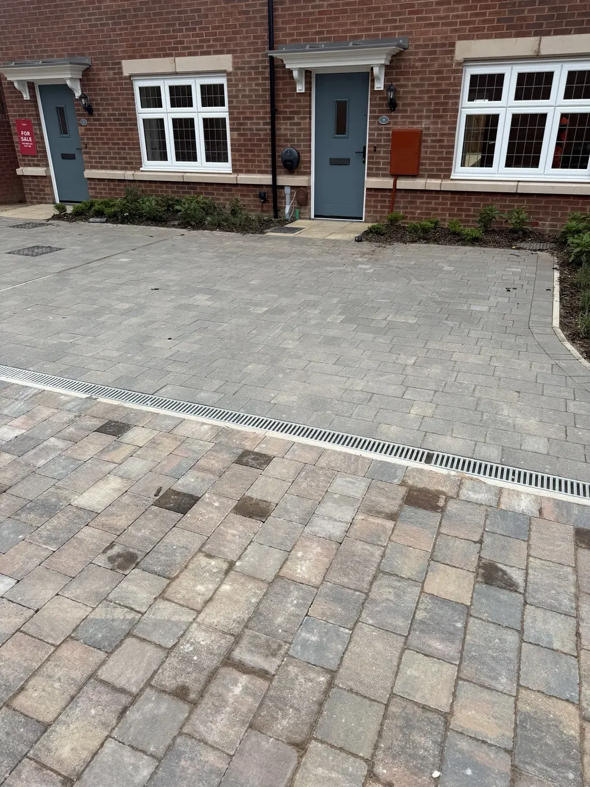 Block-paved area outside new homes in Swadlincote