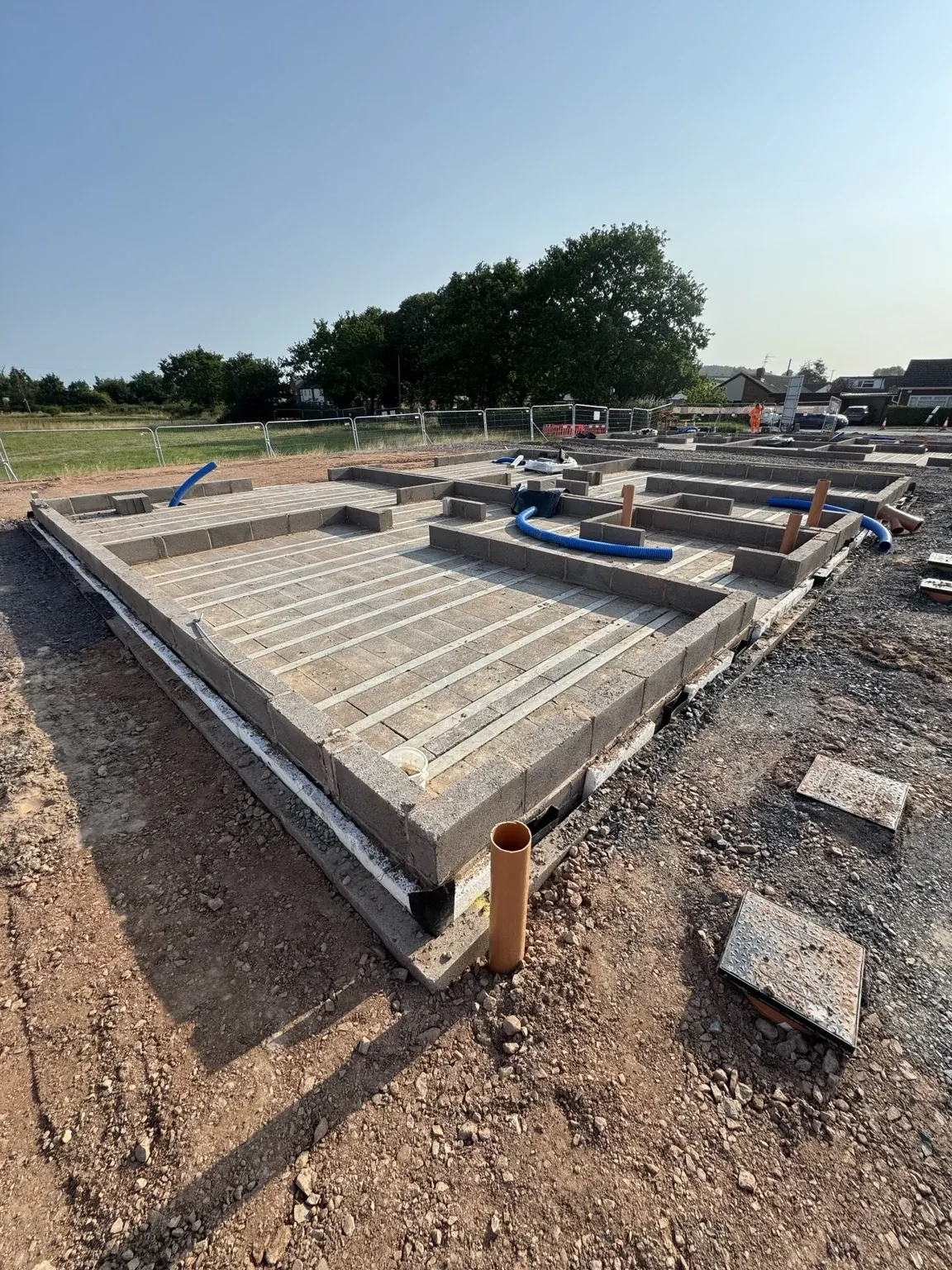 Block-and-beam floors and service entries